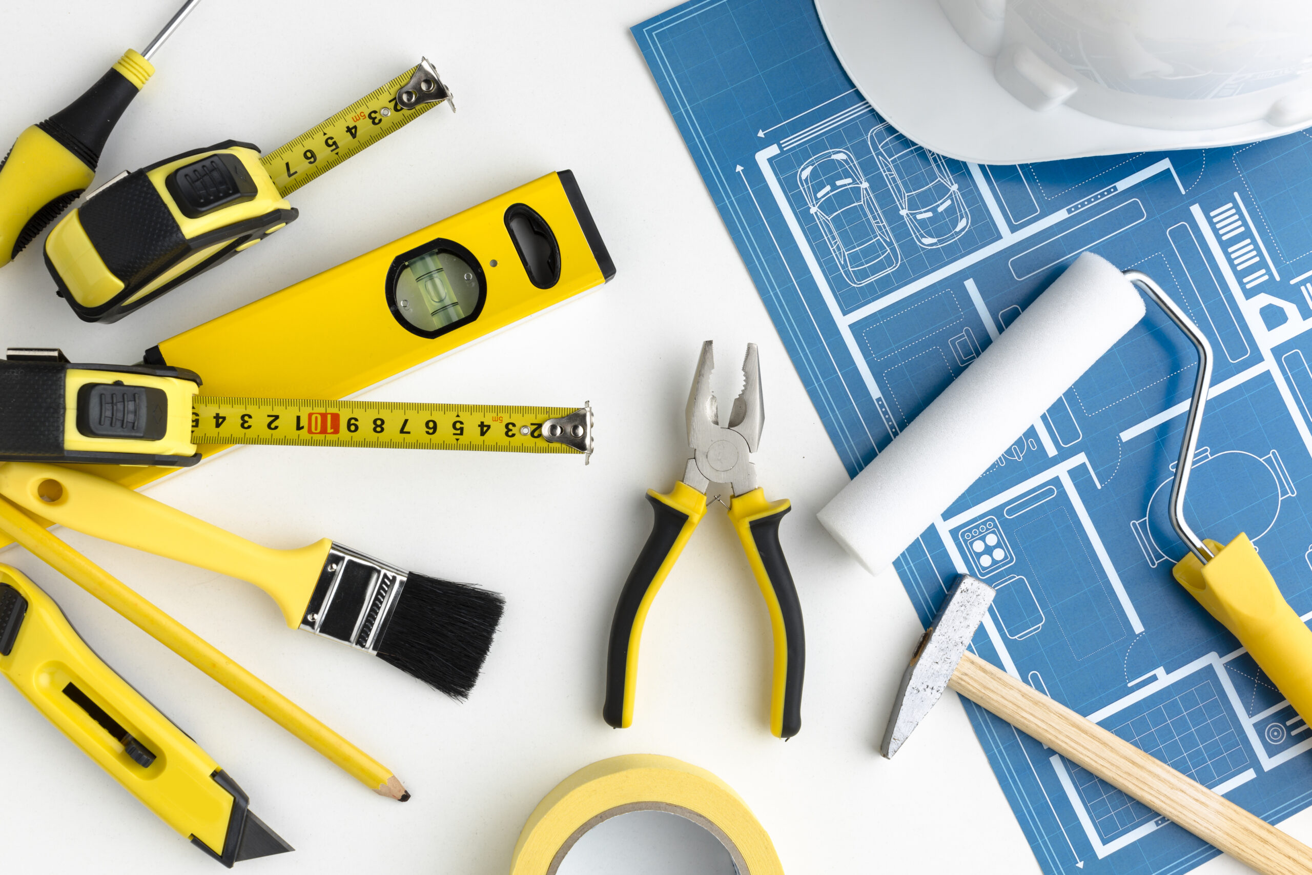 blue print arrangement yellow repair tools